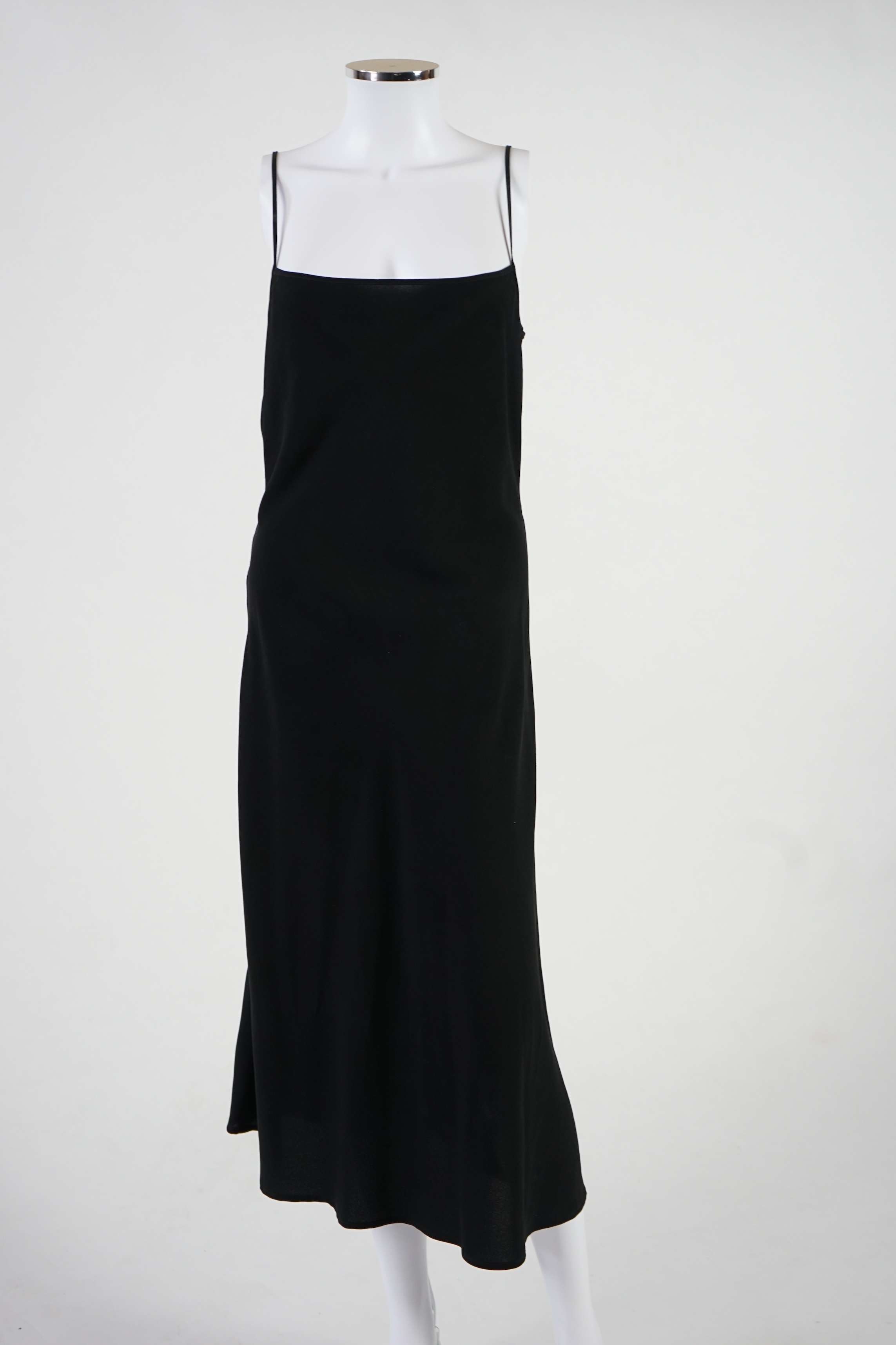 A Red Valentino black lace dress with under slip. Proceeds to Happy Paws Puppy Rescue